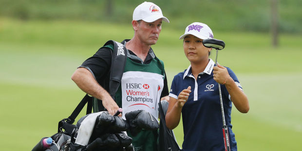 Lydia Ko of New Zealand alongside caddie Gary Matthews. Photo / Getty