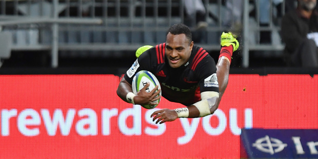 Hat-trick hero Manasa Mataele dives over to score for the Crusaders during their 50-3 win over the Sunwolves at AMI Stadium in Christchurch on Friday. Photo / Getty Images.