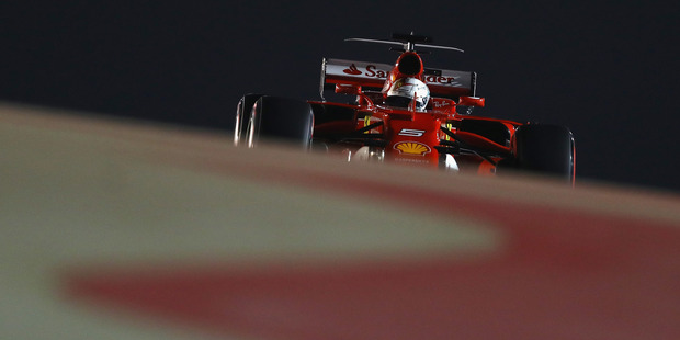 Sebastian Vettel of Germany driving the Scuderia Ferrari SF70H during qualifying for the Bahrain Formula One Grand Prix, Photo/Getty Images