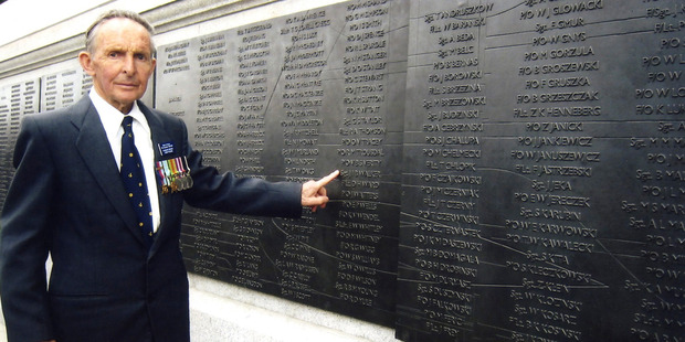 Soldier Ian Walker pointing to his name at the Battle of Britain monument. Photo / Supplied