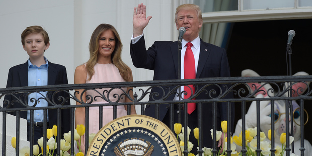 President Donald Trump, with first lady Melania Trump and their son Barron Trump, address the crowd in Washington. Photo / AP