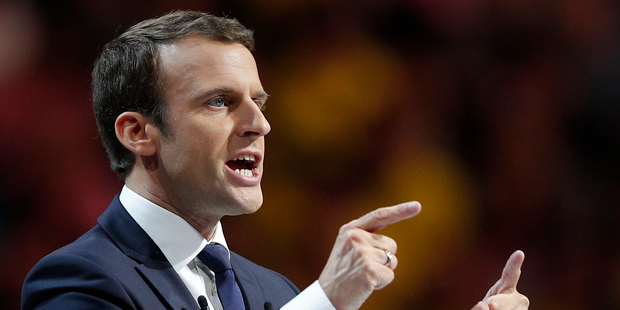 Independent centrist presidential candidate Emmanuel Macron delivers a speech during a meeting in Paris. Photo / AP