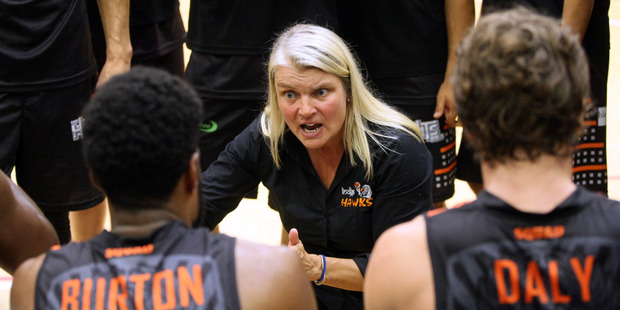 Kirstin Daly-Taylor talks to the Hawks players during a game last season. Photo / Paul Taylor