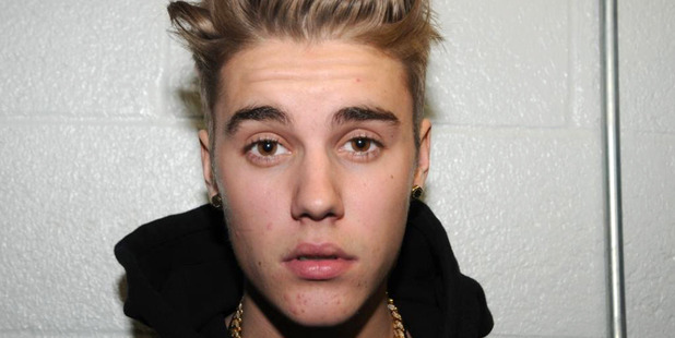 In this handout photo provided by the Miami Beach Police Department and released on March 4, 2014, singer Justin Bieber is photographed by police while in custody. Photo / Getty