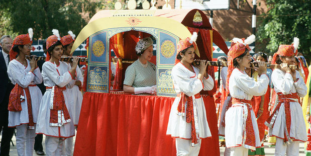 Queen Elizabeth II in a traditional Indian 'Palki' during a visit to India. Photo / Getty Images