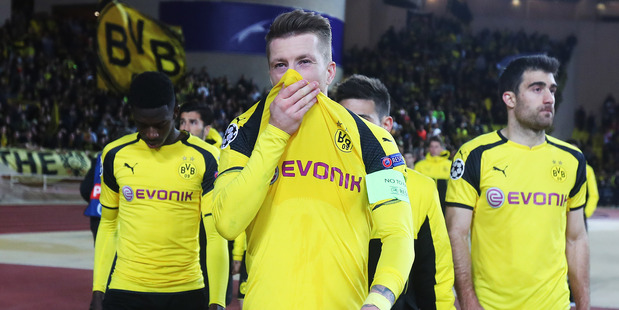 Marco Reus and his Borussia Dortmund teammates look dejected following their loss to Monaco in the Champions League quarter-final earlier this month. Photo / Getty Images.
