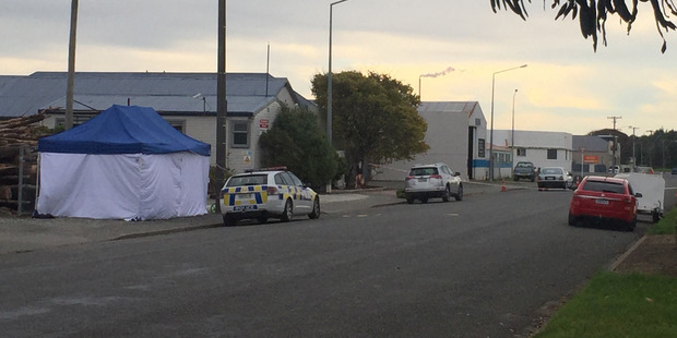 The scene at Otepuni Ave in Invercargill today after off duty policeman Ben McLean shot his estranged wife and another man last night. Photo / Kurt Bayer