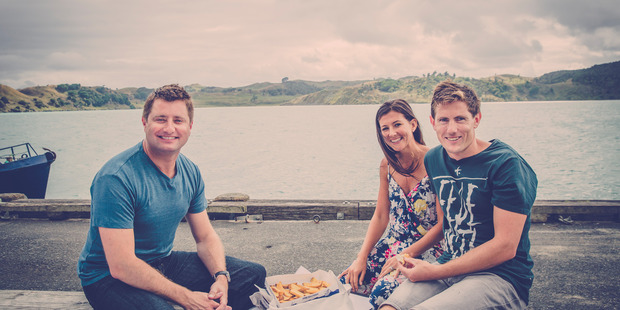 UK architect George Clarke and the Kluts take time out from building with some fish and chips. Photo/Mitre 10