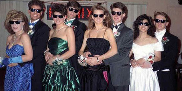 They thought it would be a good idea to wear matching sunglasses. Photo /