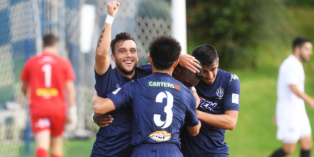 Clayton Lewis celebrates Joao Moreira's second goal. Photo / Photosport