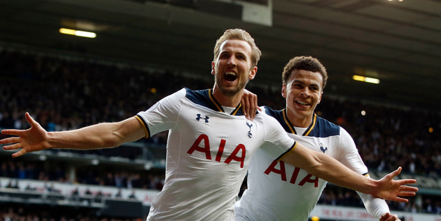 Tottenham Hotspur's Harry Kane, front, celebrates after scoring a penalty. Photo / AP