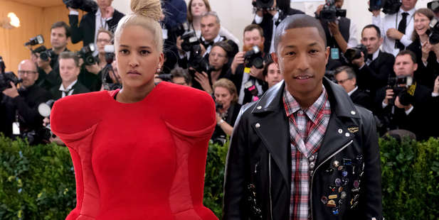 It's hard to focus on the NZME merger decision when Pharrell Williams' wife Helen Lasichanh hits the Met Gala looking like an armchair. Photo / AP