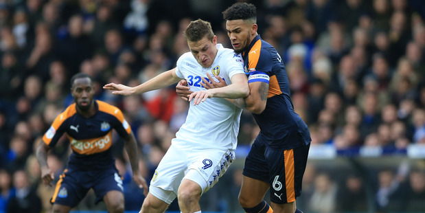 Leeds United's Chris Wood (left) will not be plying his trade in the Premier League for Leeds next season after failing to secure a Championship play-off spot. Photo / Getty Images.