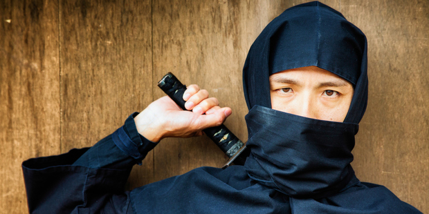 A menacing Japanese ninja clutches a razor-sharp samurai sword. Photo / Getty Images