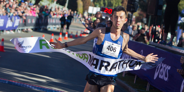 Japanese runner Saeki Makino crosses the line at the end of today's Rotorua Marathon. PHOTO: BEN FRASER