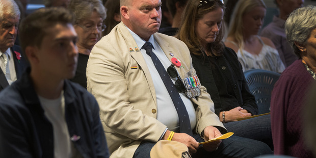 Rob Clark wore medals proclaiming service across the world.