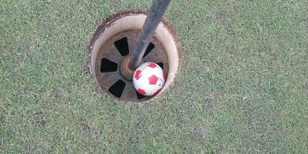 Johnny Keating's footy-style golf ball sits right where the magpie left it.