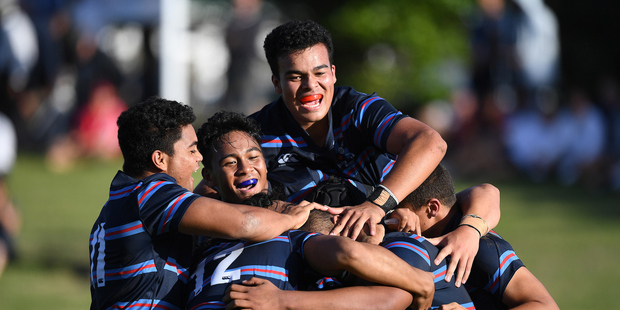 Sacred Heart players celebrate Fatongia Paea's try against Auckland Grammar. Photosport