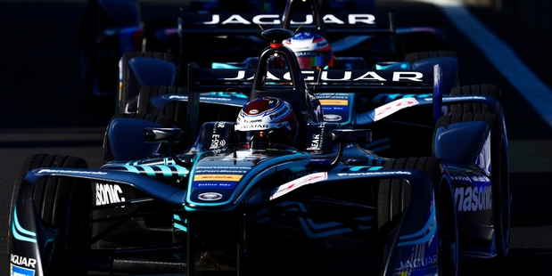 Jaguar teammates Adam Carroll (front) and Kiwi Mitch Evans are beginning to make up ground in the Formula E series. Photo / Getty