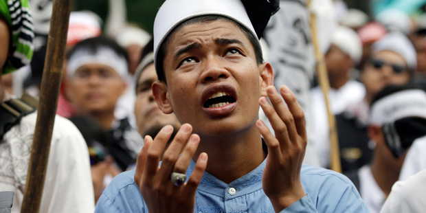 Jakarta's Christian governor jailed for blasphemy against Islam