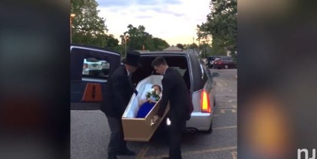 Drop dead gorgeous teenage girl shows up for prom in coffin