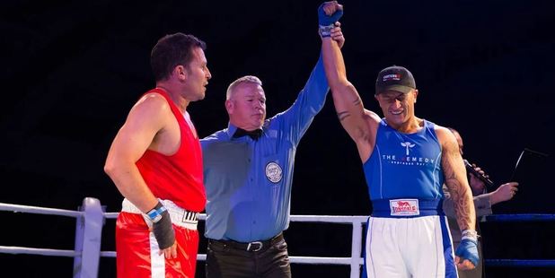 AND THE WINNER IS: Charlie Rudd is declared the winner in his fight against David Silk.
Photo / Michelle Davies