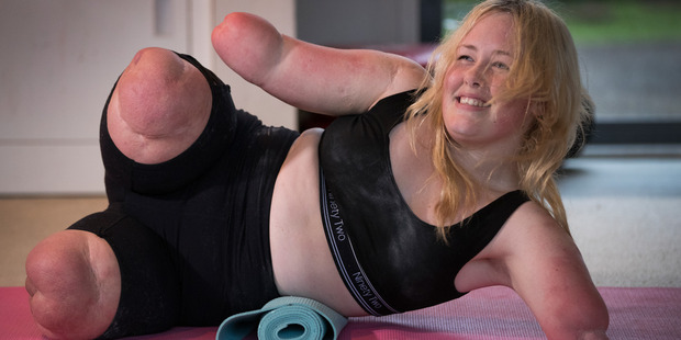Charlotte crunching her abs as part of her weekly boxing training regime. NZ Herald photograph by Brett Phibbs
