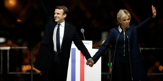 French kiss: passionate Macron supporters celebrate their new president