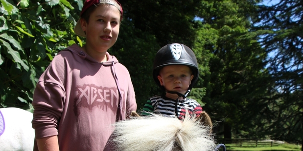 Braith Webb (2) of Stratford enjoyed a ride on Comet. He was accompanied by his uncle, Zane Schoemaker (14).
