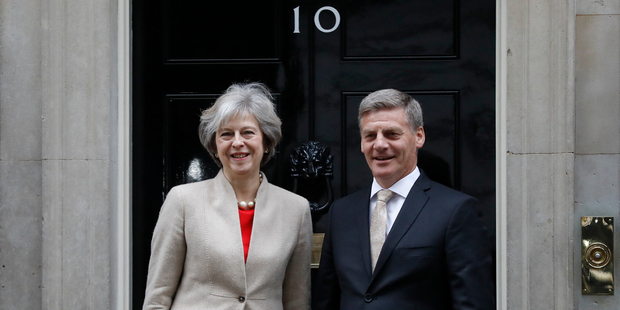 Britain's Prime Minister Theresa May, left, greets the Prime Minister of New Zealand Bill English on the doorstep of 10 Downing Street. Photo / AP