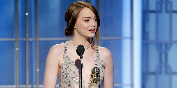 Emma Stone accepting her Golden Globe for La La Land. Photo/AP