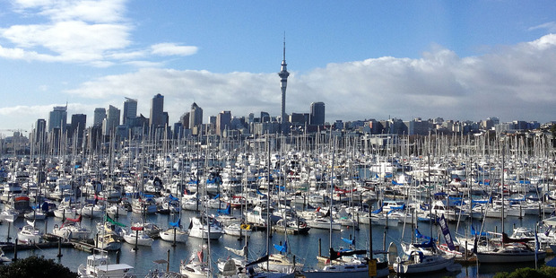 A view from the Auckland Harbour Bridge across Westhaven marina to Auckland City.