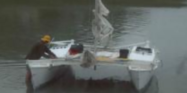 Alan Langdon and his catamaran. Photo / Supplied