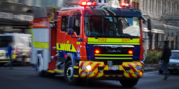 The Fire Service said the blaze began in a records room in a 16-storey building, which holds both apartments and offices. Photo / File