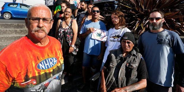 Supporters and members of the Daktory Whangarei led by Rob Beeston, front left, outside court before the appearance of Sarah Gwenneth Gillgren. Photo / John Stone
