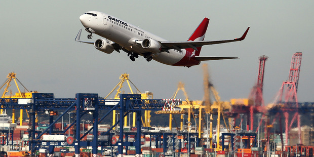 A Qantas Airways plane takes off at Sydney Airport. Photo / Brendon Thorne, Bloomberg