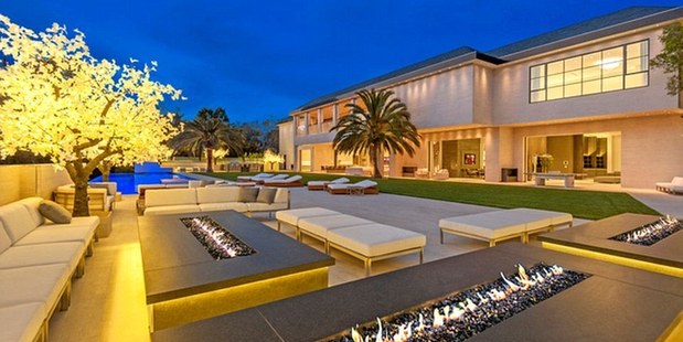 The property comes equipped with an entertainment pad. It boasts a lounge, theatre complex, wine room and separate valet entrance. Photo / MLS