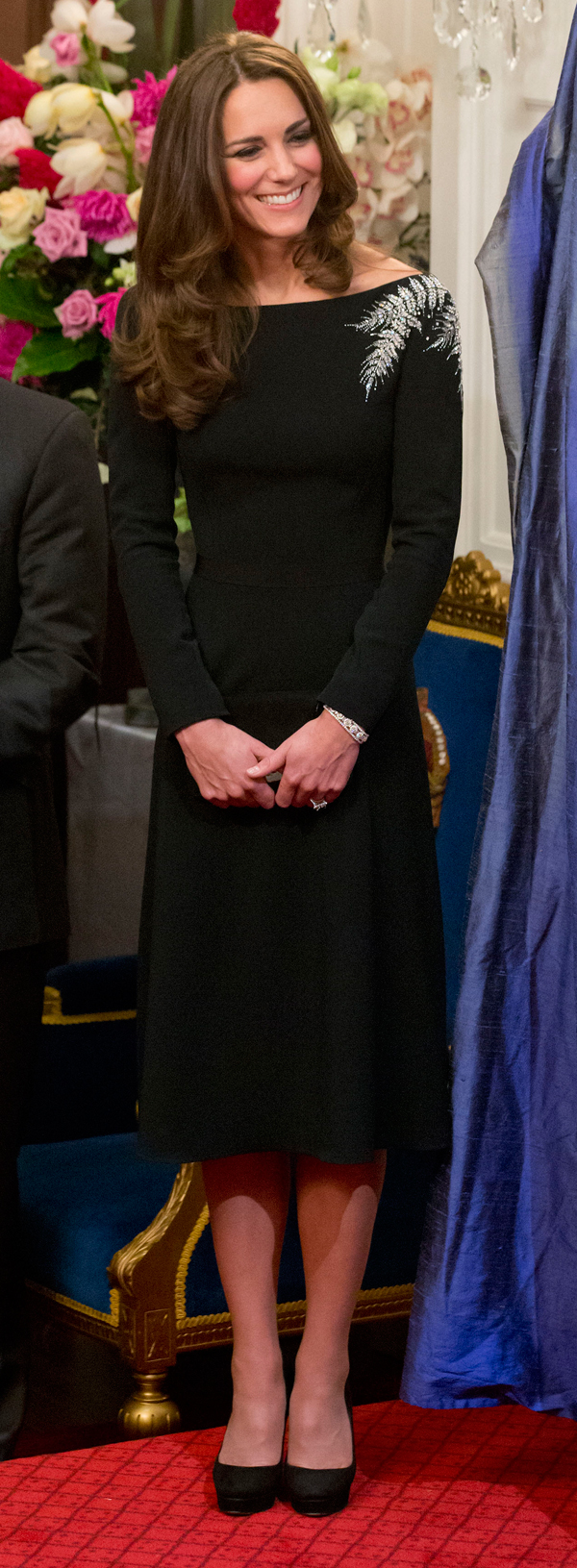 Kate showed her fashion nous in this off the shoulder dress. Photo / Mark Mitchell