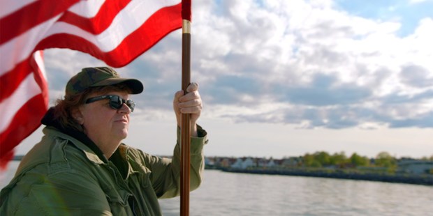 Michael Moore is taking on Donald Trump for his latest movie. Photo/AP