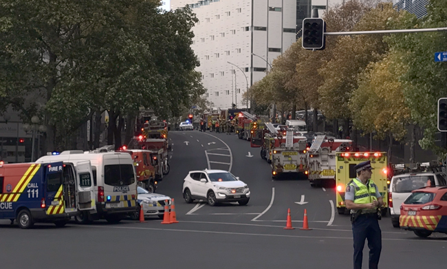 Fire and police at the fire in Auckland's CBD. Photo / Colin Ennor