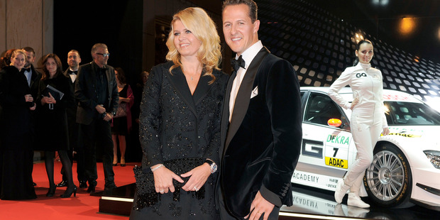 Corinna and Michael Schumacher attend the GQ Men Of The Year 2010 award ceremony. Photo/Getty Images