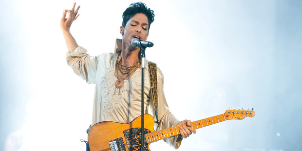 Prince headlines the main stage on the last day of Hop Farm Festival in 2011. Photo / Getty