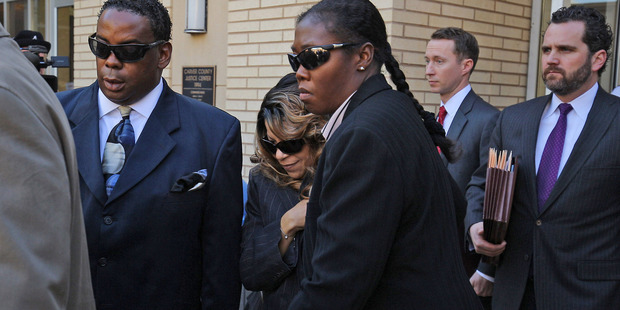 Tyka Nelson, the sister of Prince, and her attorneys exit the Carver County court house after the first hearing on the musician's estate on May 2, 2016. Photo / Getty