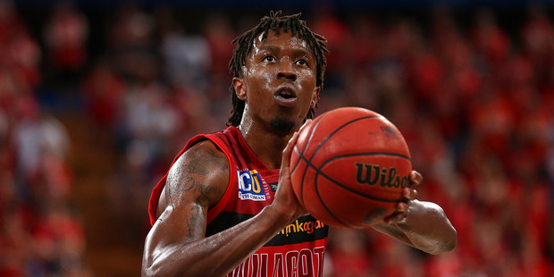 Jaron Johnson of the Wildcats shoots a free throw against the Breakers. Photo / Getty Images