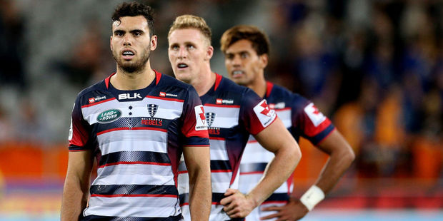 Melbourne Rebels players in the midst of another loss. Photo / Getty