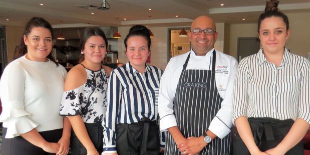 Fine dining was experienced by Waiopehu College students, from left, Tiana Thomas, Chantelle Cundy, Maya Machuca, Copthorne Hotel executive chef Cheten Pangam, and Amber Graham. WGP 17May17 - FIN