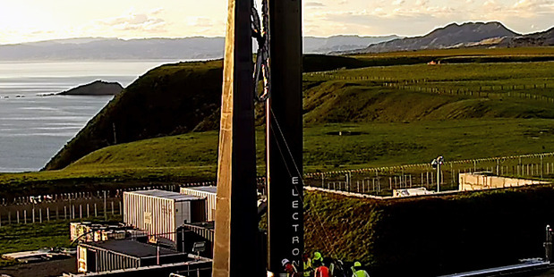 STALLED: Rocket Lab's Electron rocket at the launch site on the Mahia Peninsula, where liftoff has been delayed at least a day because of a forecast for wind. PHOTO/FILE
