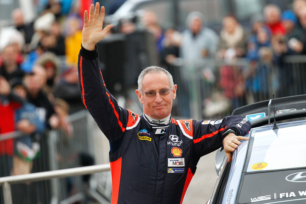John Kennard waves to the crowd during WRC Great Britain 2015. Photo / Photosport