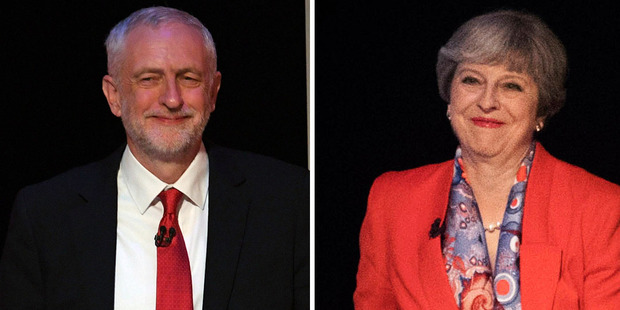 May plays down election loss poll