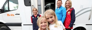 The Bedford family Jamie, 10 (left), Sasha, 6, Ella, 9, dad Robin and mum Rhiannon. Photo / Getty Images